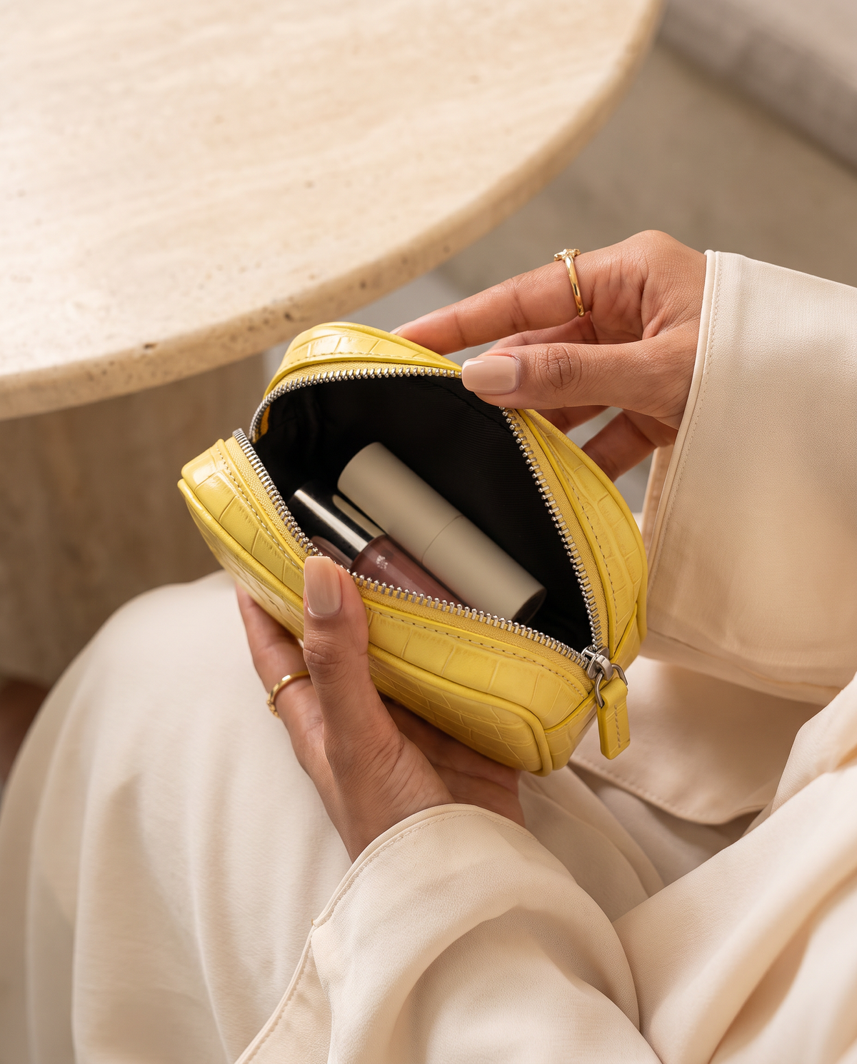 Lip Essential in Yellow — open in hands