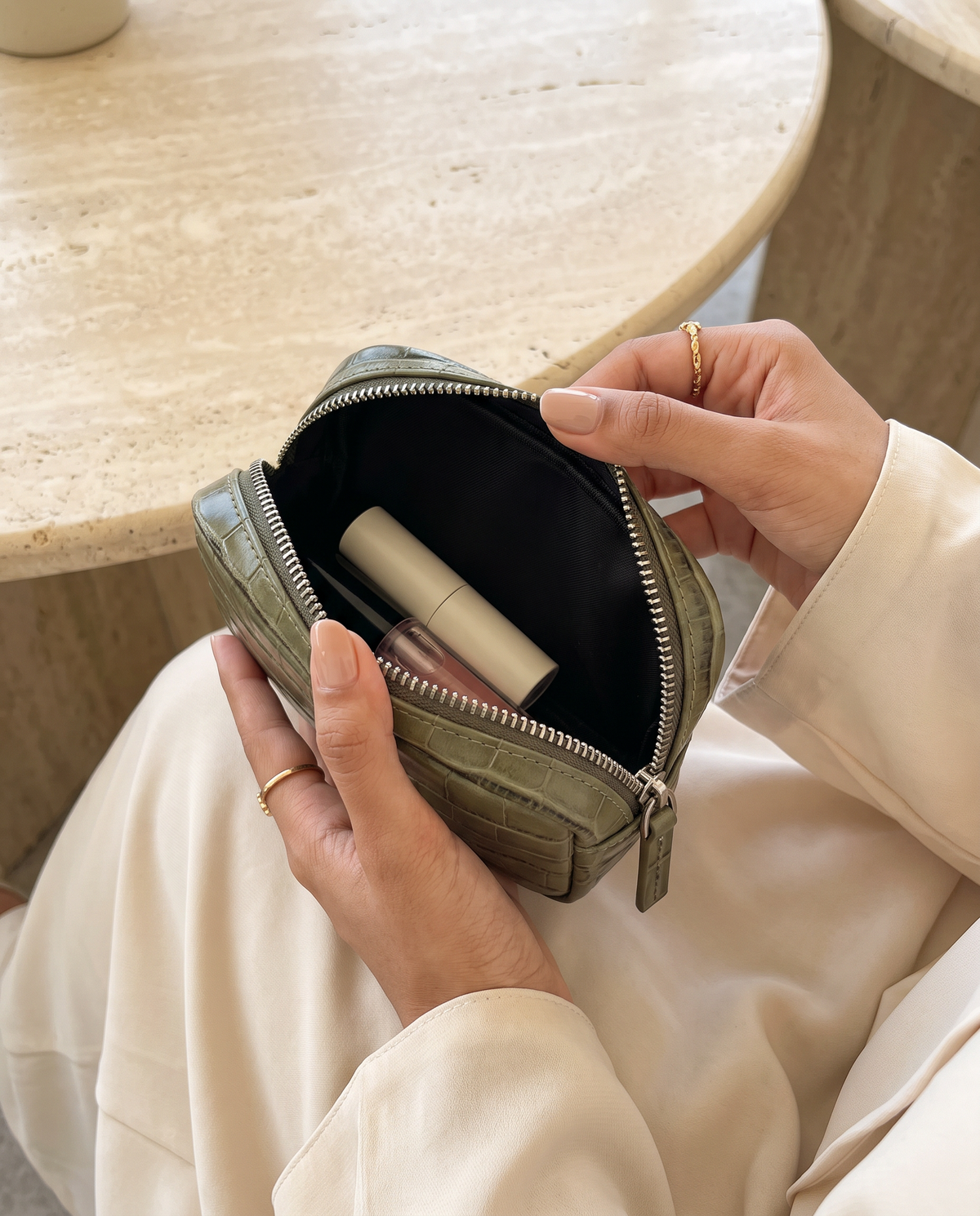 Lip Essential in Khaki — open in hands