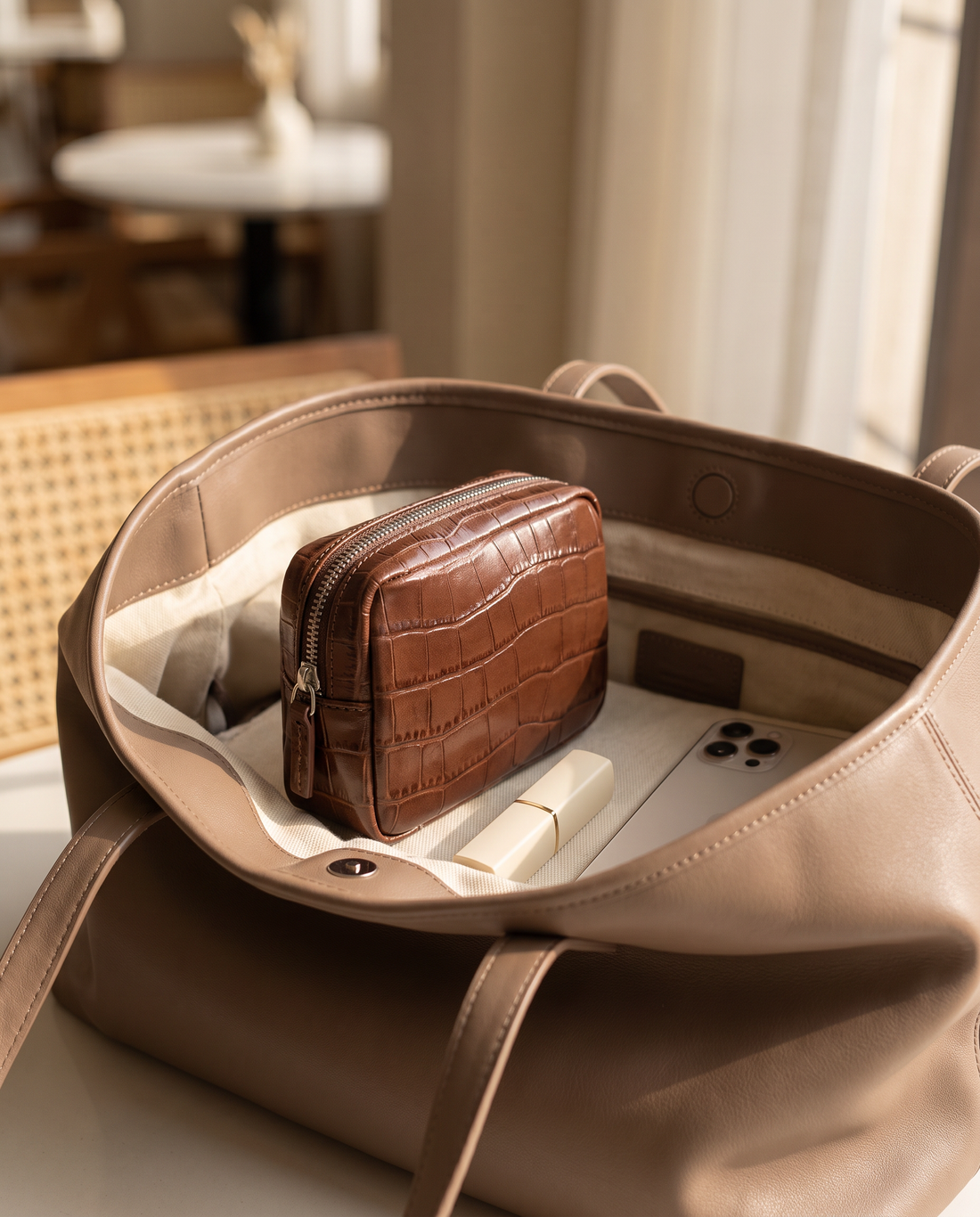 Lip Essential in Chocolate — inside a handbag