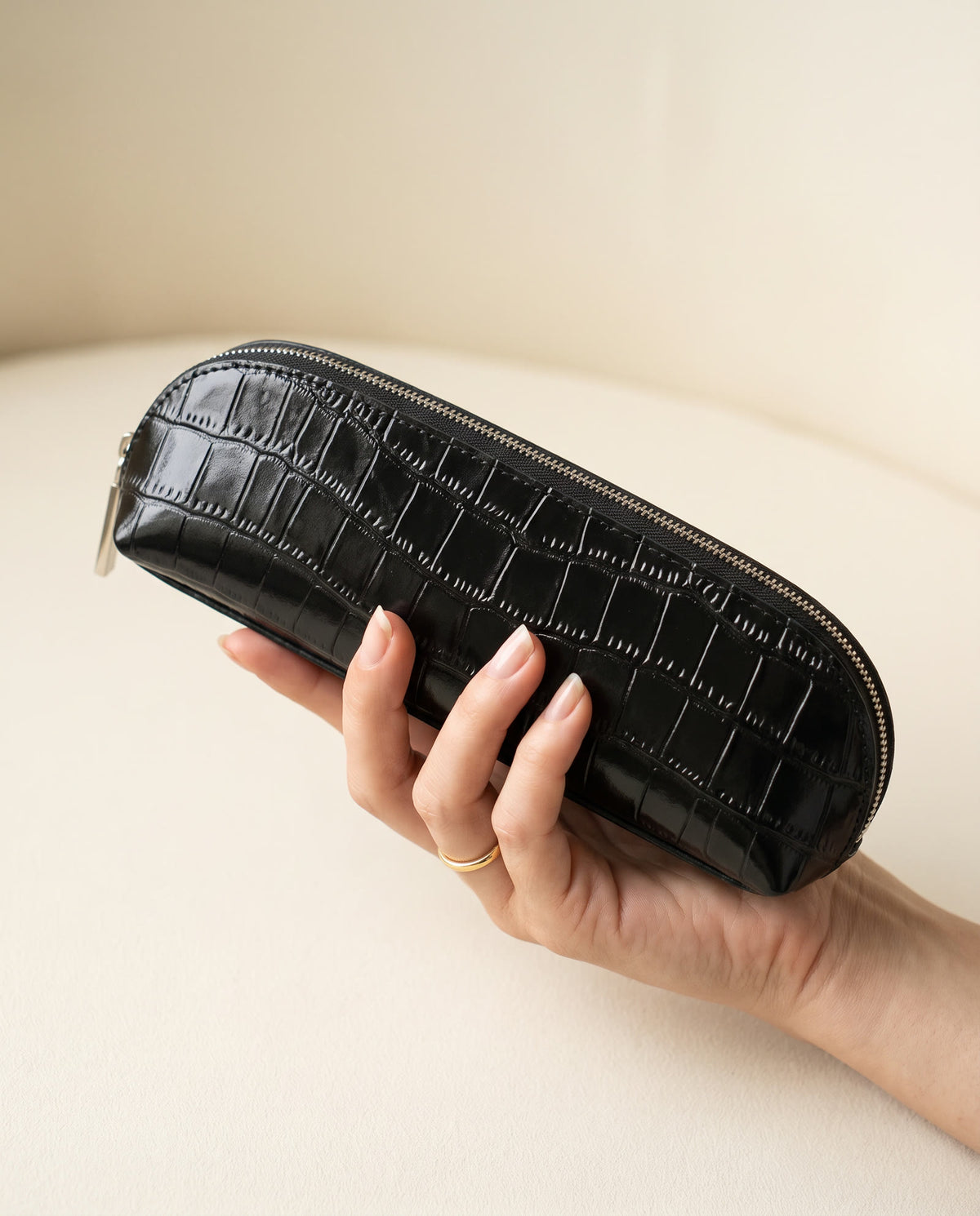 The Amira Brush Case — Black — in hand [v2]