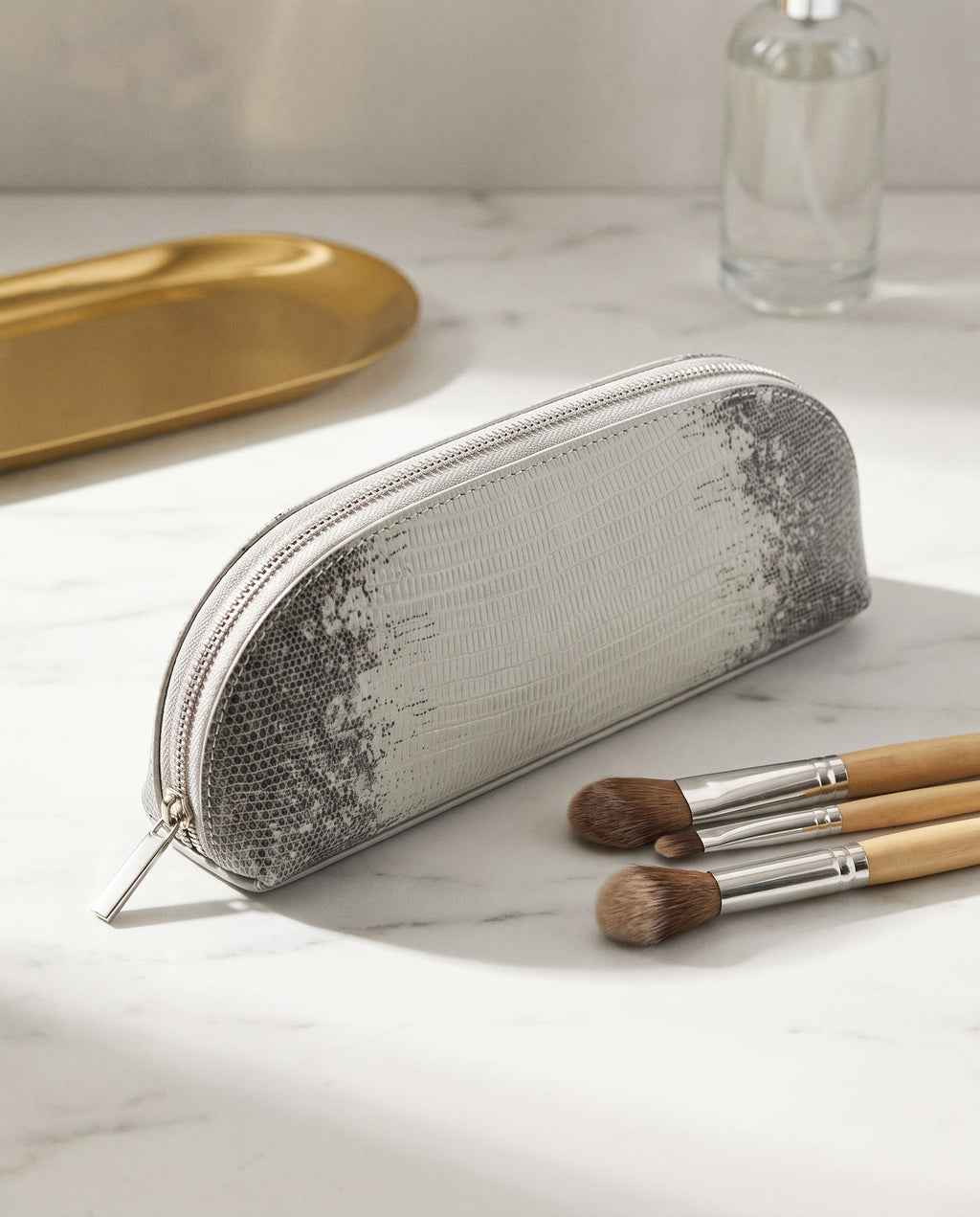 The Amira Brush Case — Silver Lizard — on the dressing table [v2]