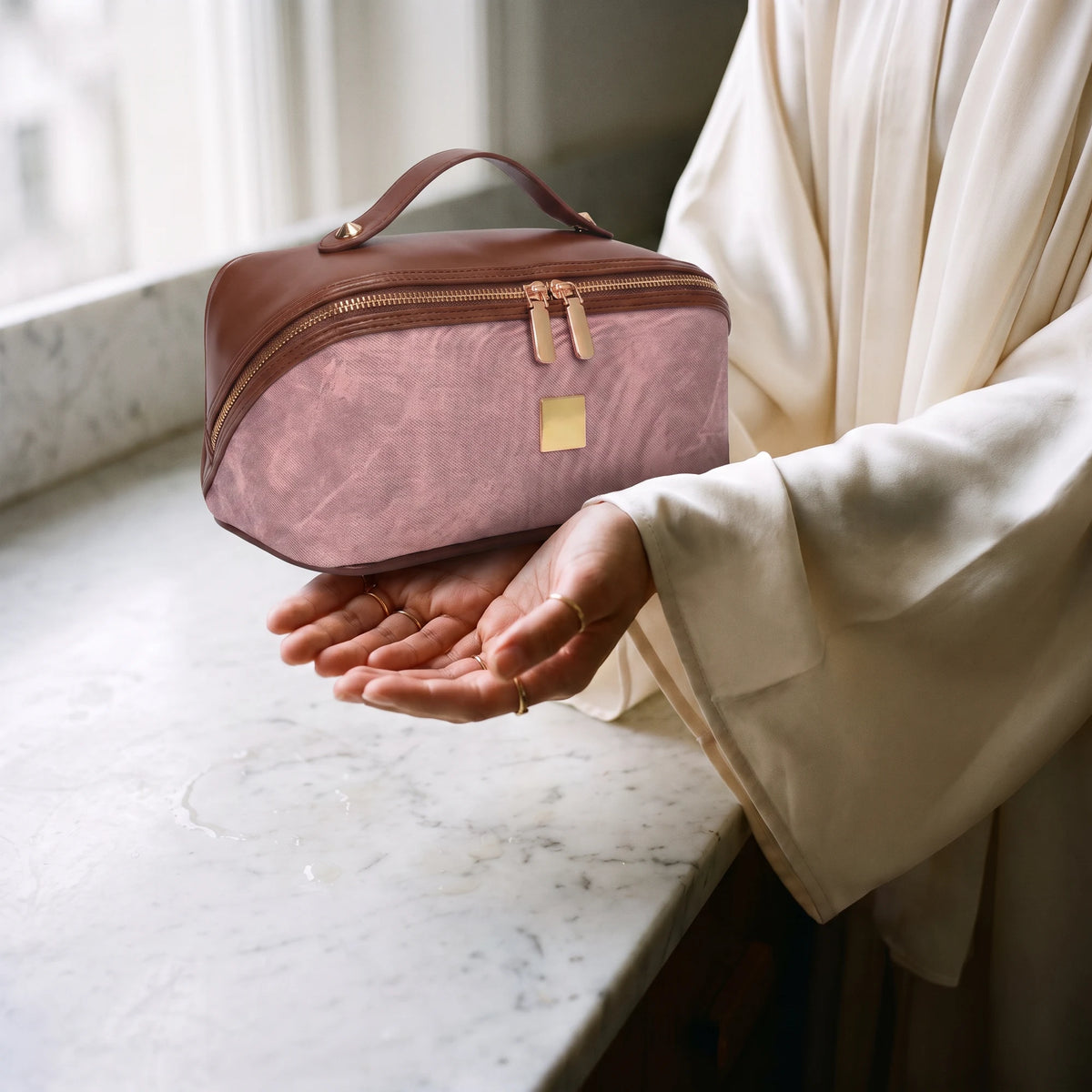 rose-quartz-vanity-rose-quartz in hands