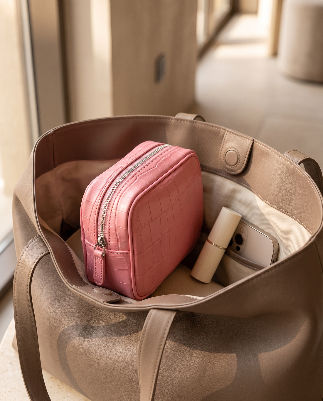 Lip Essential in Pink — inside a handbag