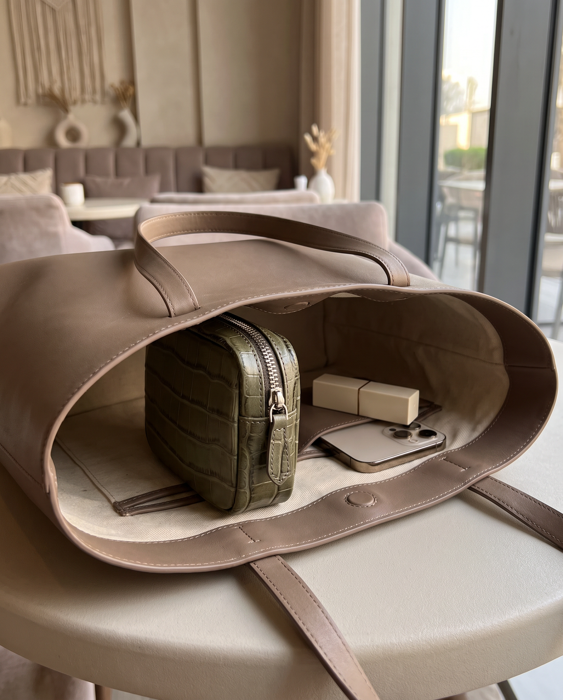 Lip Essential in Khaki — inside a handbag