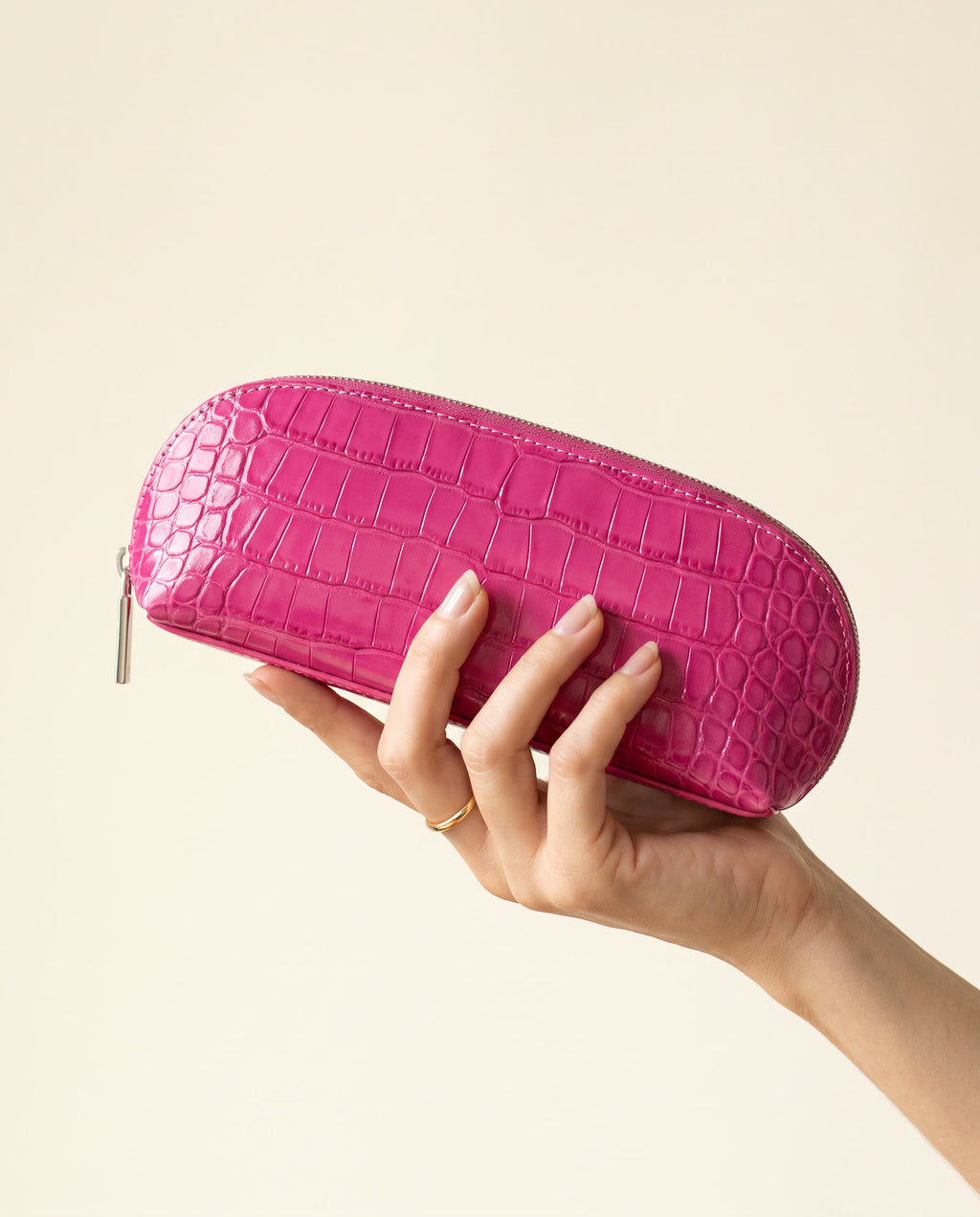 The Amira Brush Case — Fuchsia — in hand [v2]