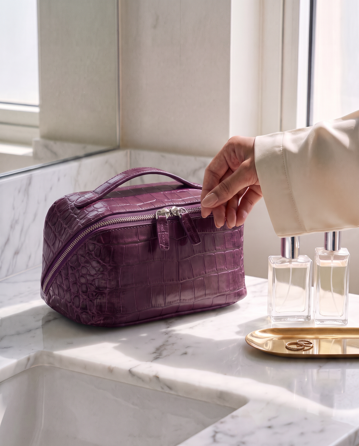 The Amira Covers — Plum, on a marble counter · Elirati · 2026-10b