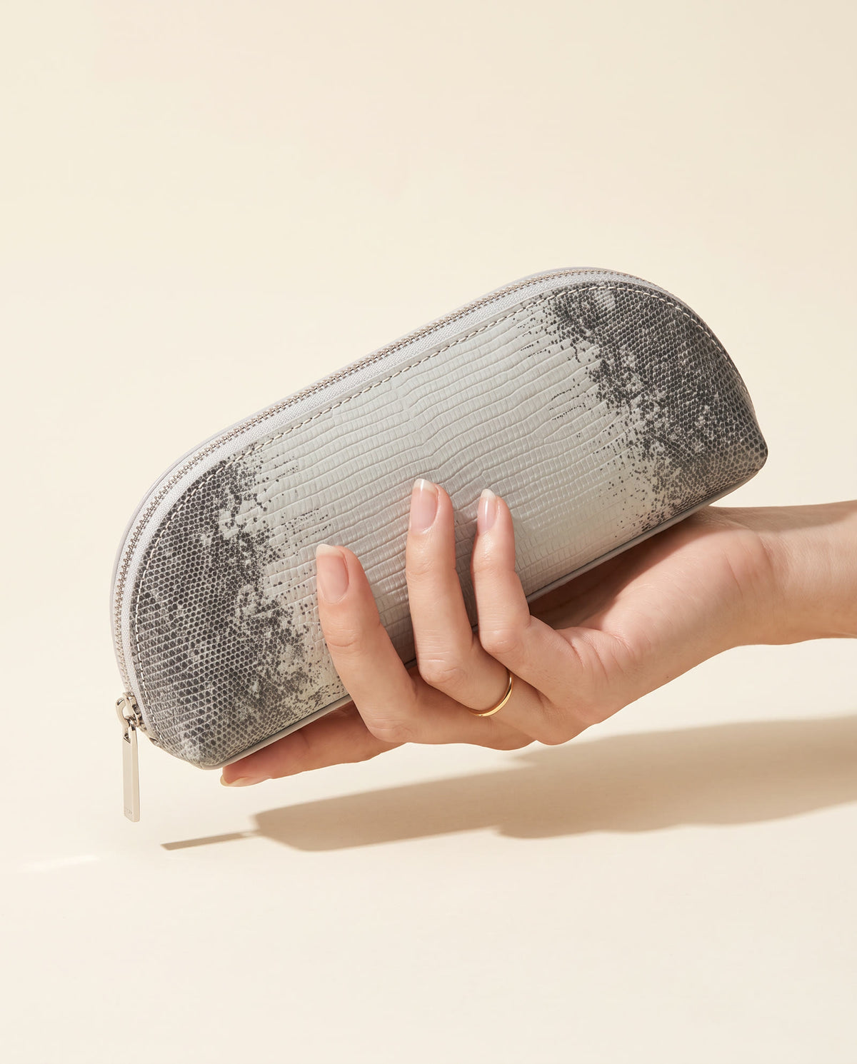 The Amira Brush Case — Silver Lizard — in hand [v2]