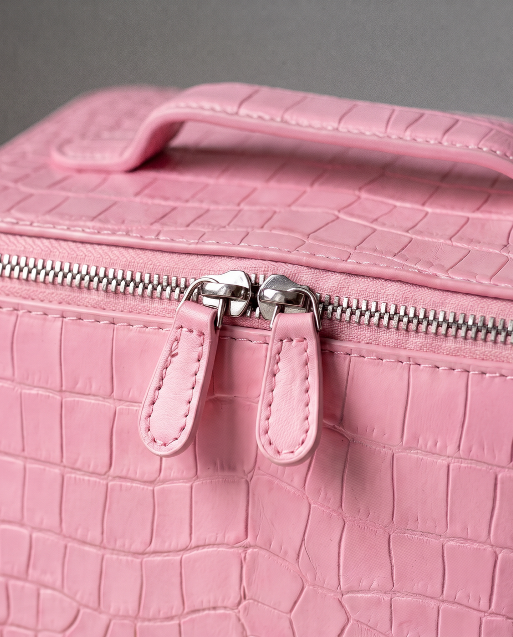 The Amira Covers — Sakura Pink, texture and zip detail · Elirati · 2026-10b