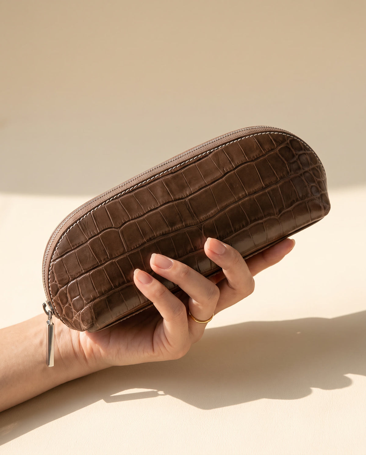 The Amira Brush Case — Mocha — in hand [v2]