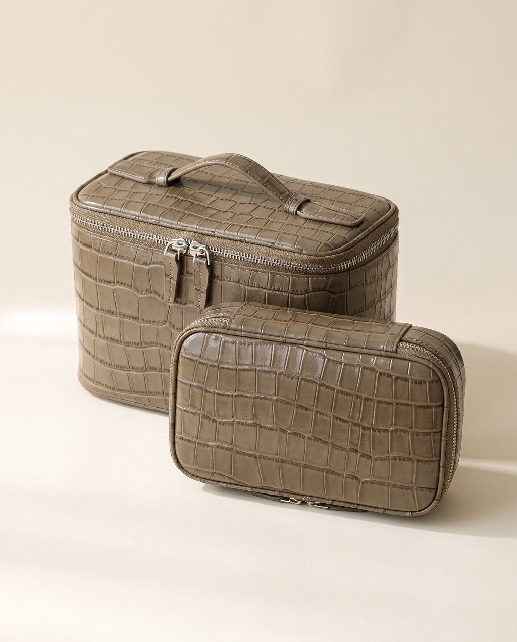 The Amira Pouch — Elephant Grey, with its matching pouch · Elirati