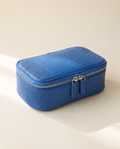 The Amira Pouch — Klein Blue, three-quarter view · Elirati