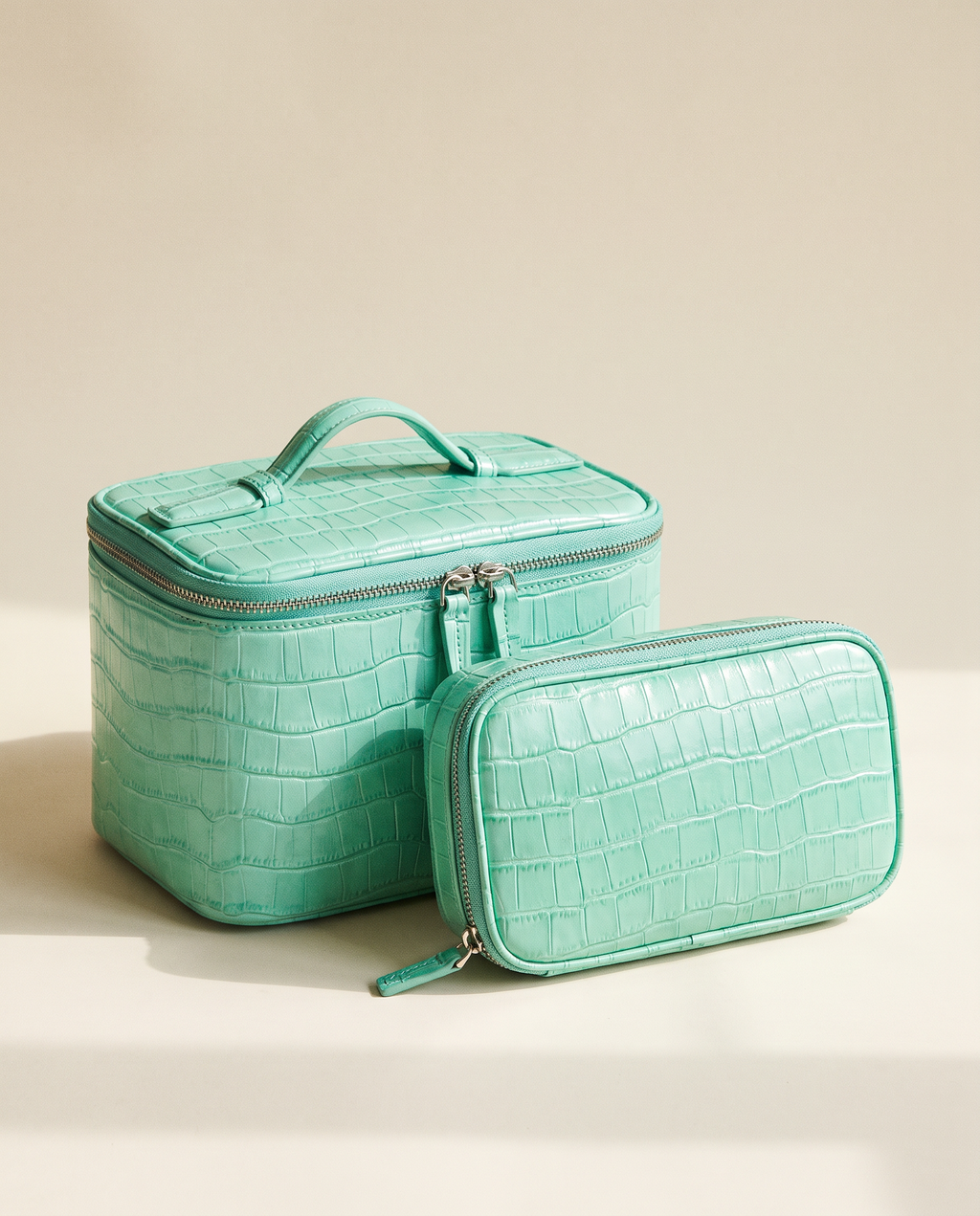 The Amira Pouch — Mint, with its matching pouch · Elirati