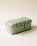 The Amira Pouch — Pistachio, three-quarter view · Elirati