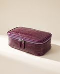 The Amira Pouch — Plum, three-quarter view · Elirati