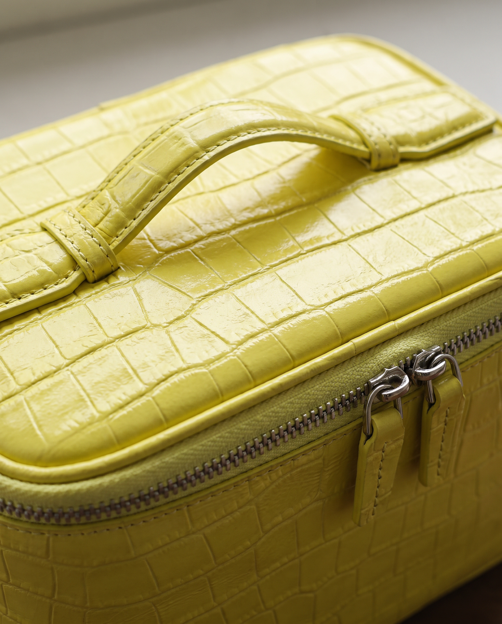 The Amira Vanity — Butter, texture and zip detail · Elirati