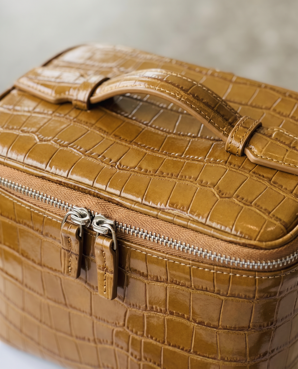 The Amira Vanity — Caramel, texture and zip detail · Elirati