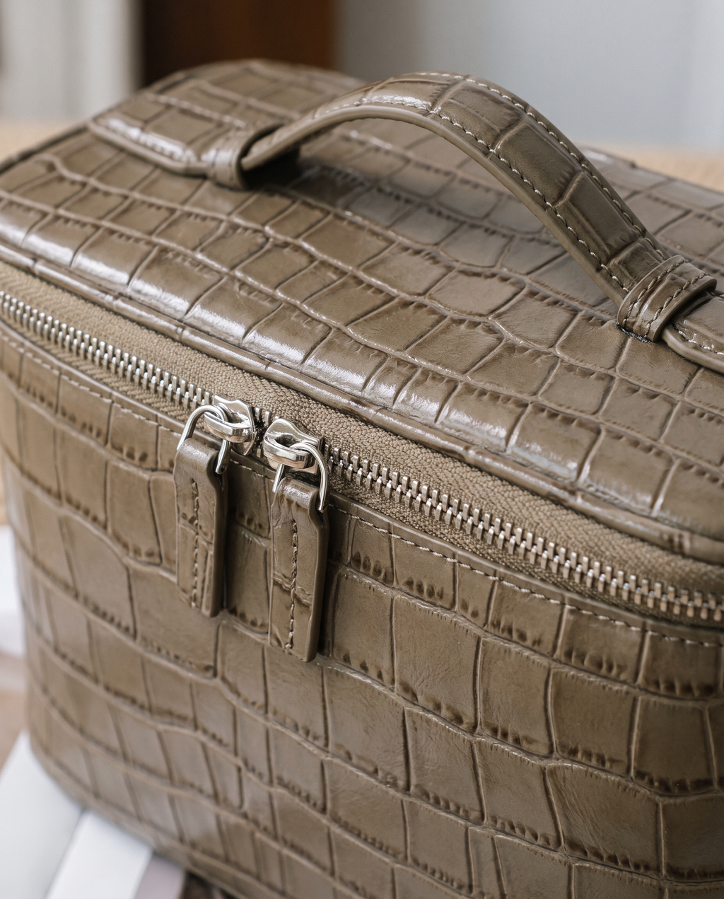 The Amira Vanity — Elephant Grey, texture and zip detail · Elirati