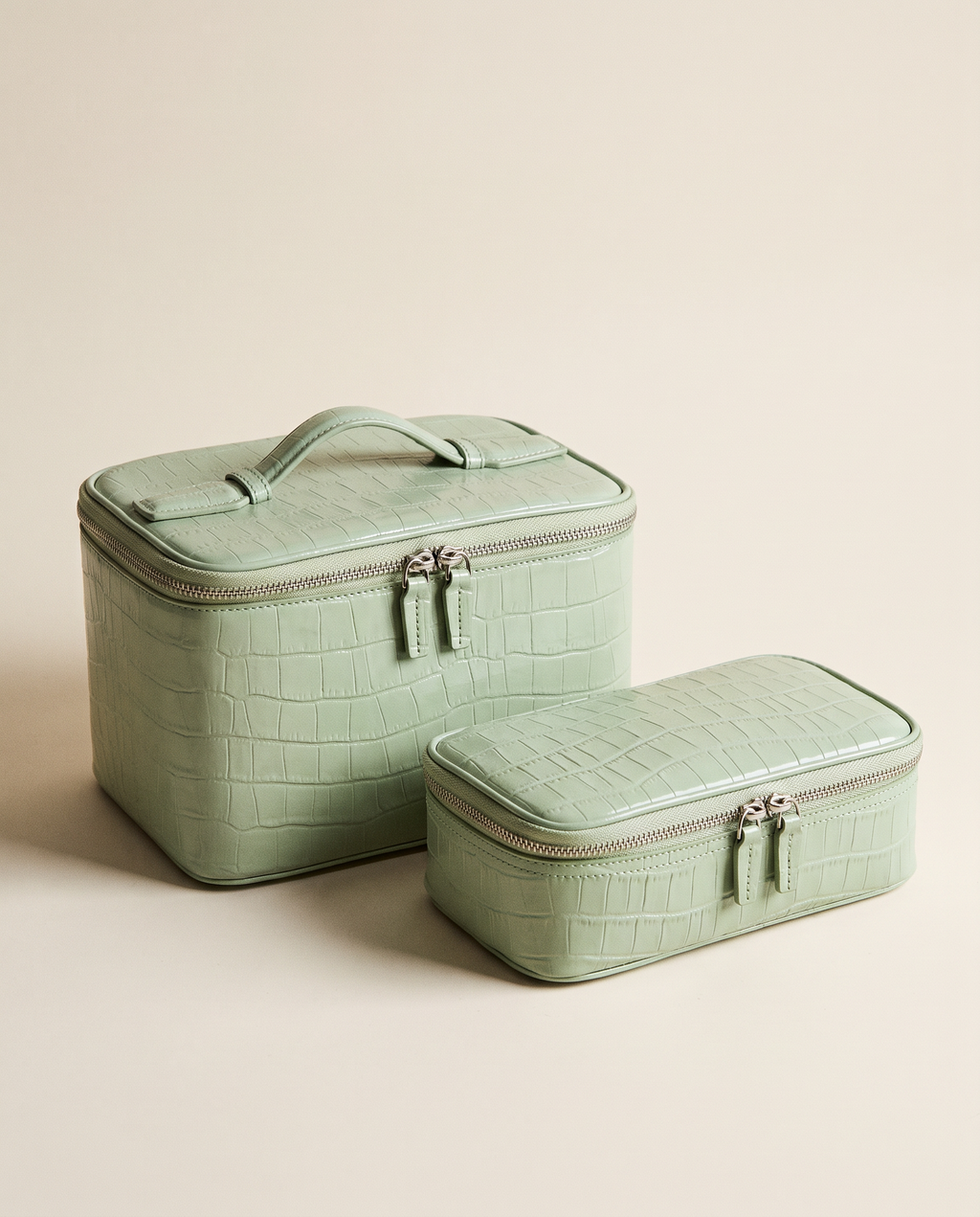The Amira Vanity — Pistachio, with its matching pouch · Elirati