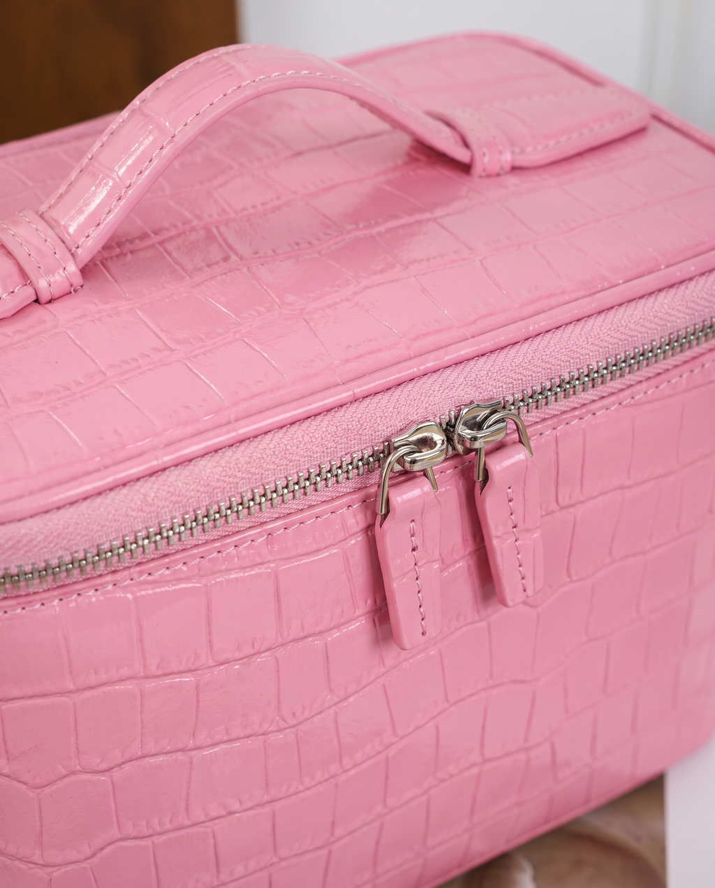 The Amira Vanity — Sakura Pink, texture and zip detail · Elirati
