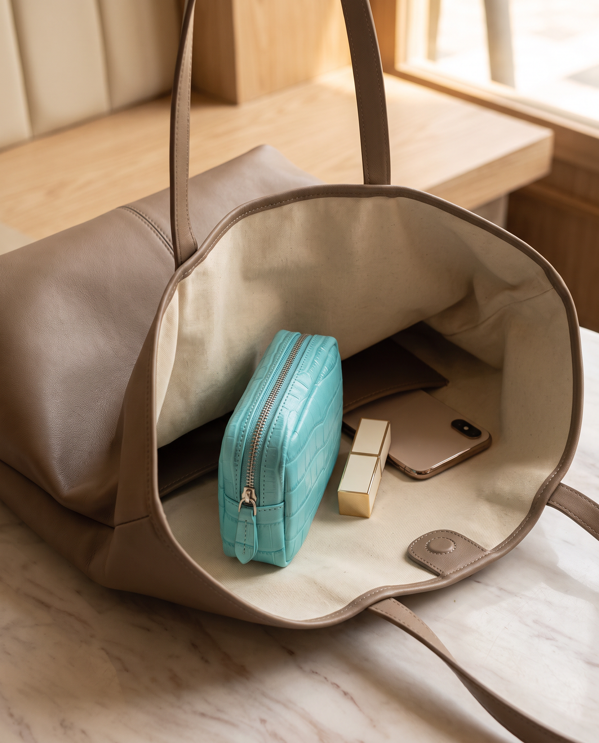 Lip Essential in Turquoise — inside a handbag